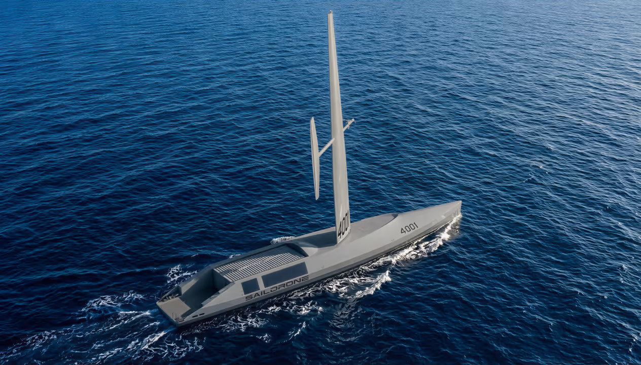 Spectre Silent Endurance Saildrone with wing system sailing on a dark blue ocean