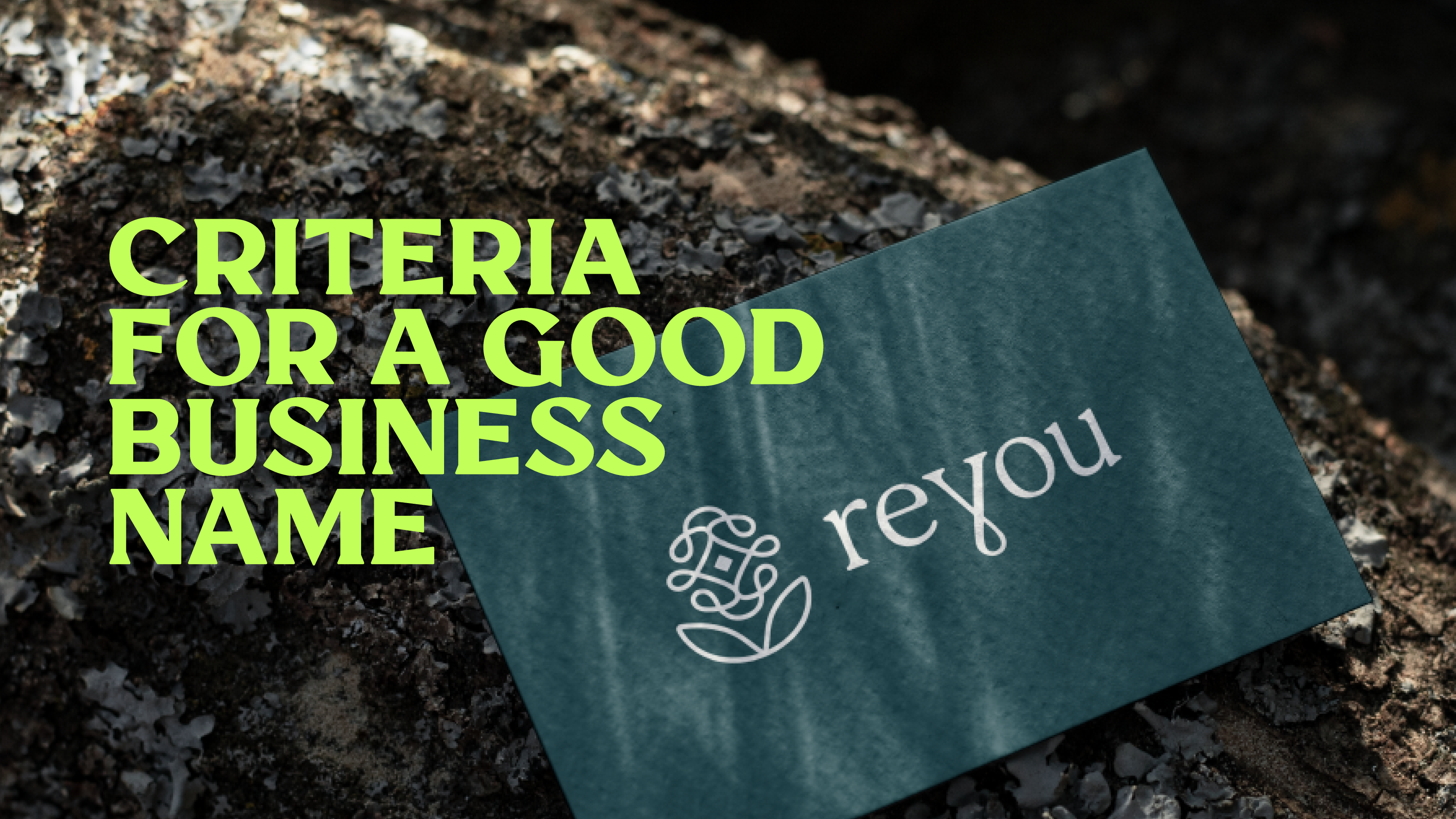 A close-up of a business card with the logo and brand name 'Reyou' on it, placed on a rough stone surface. The text 'Criteria for a Good Business Name' is prominently displayed in large, bold letters, overlaying the image. The image represents the concept of choosing a strong, effective brand name.