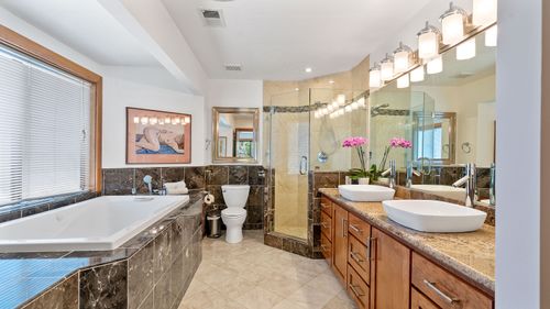 Real Estate Photograph of a living room and kitchen