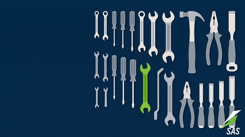 A workshop tool wall with tools hung in neat order from small to large