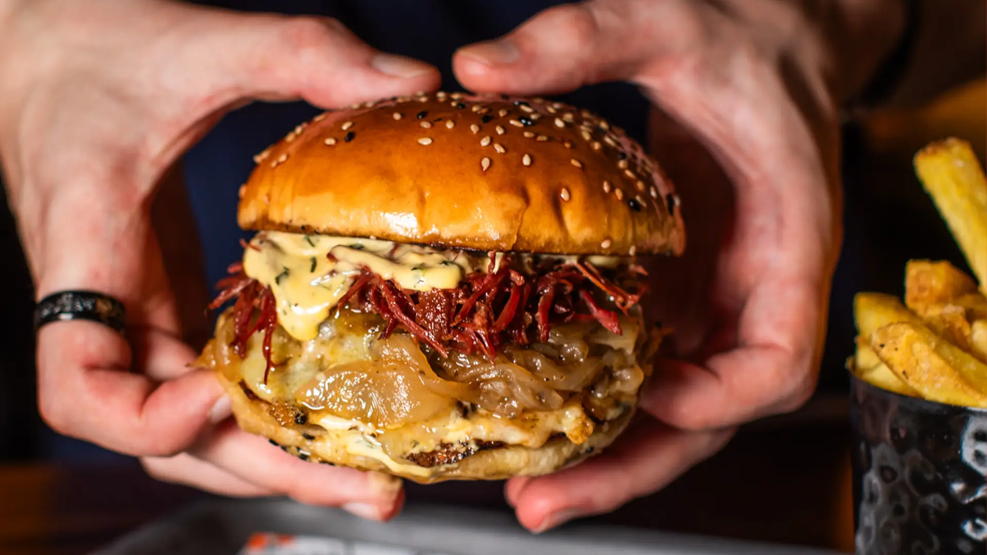 Join us for National Burger Day and get two for one on the legendary Cowabunga burger