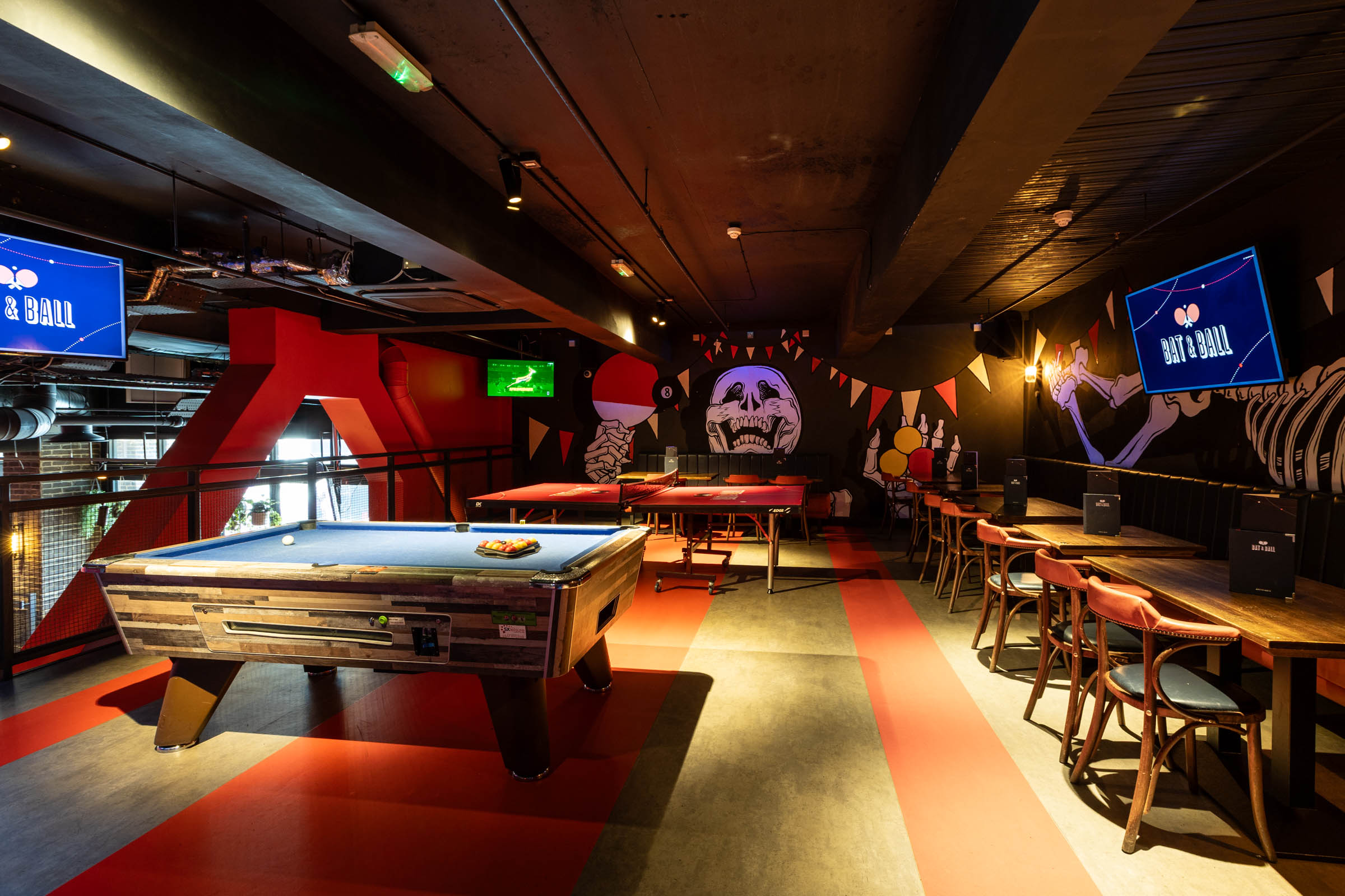 The Ping Pong Parlour is on its own mezzanine on our first floor The Arena and can host up to 50 guests. It includes 3 HD TVs to show sports fixtures and 2 ping pong/beer pong tables, with bench and bar stool seating wrapping around the space. Perfect for a business meeting, workshop or a private party.