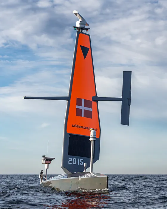 Saildrone Voyager with Danish flag on the wing