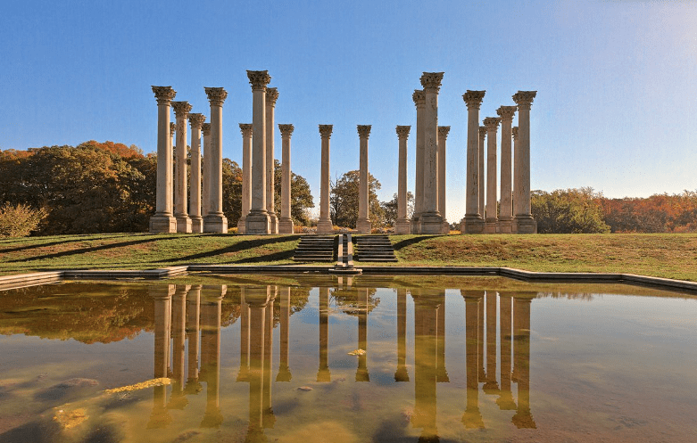 View of the National Capitol Columns and reflective pool in the fall