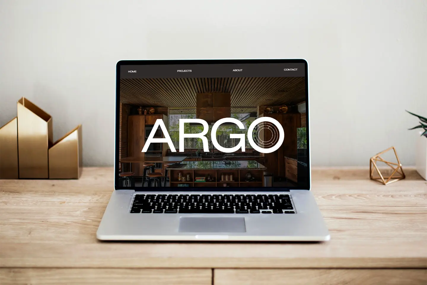 A laptop with the word Argo on the screen.