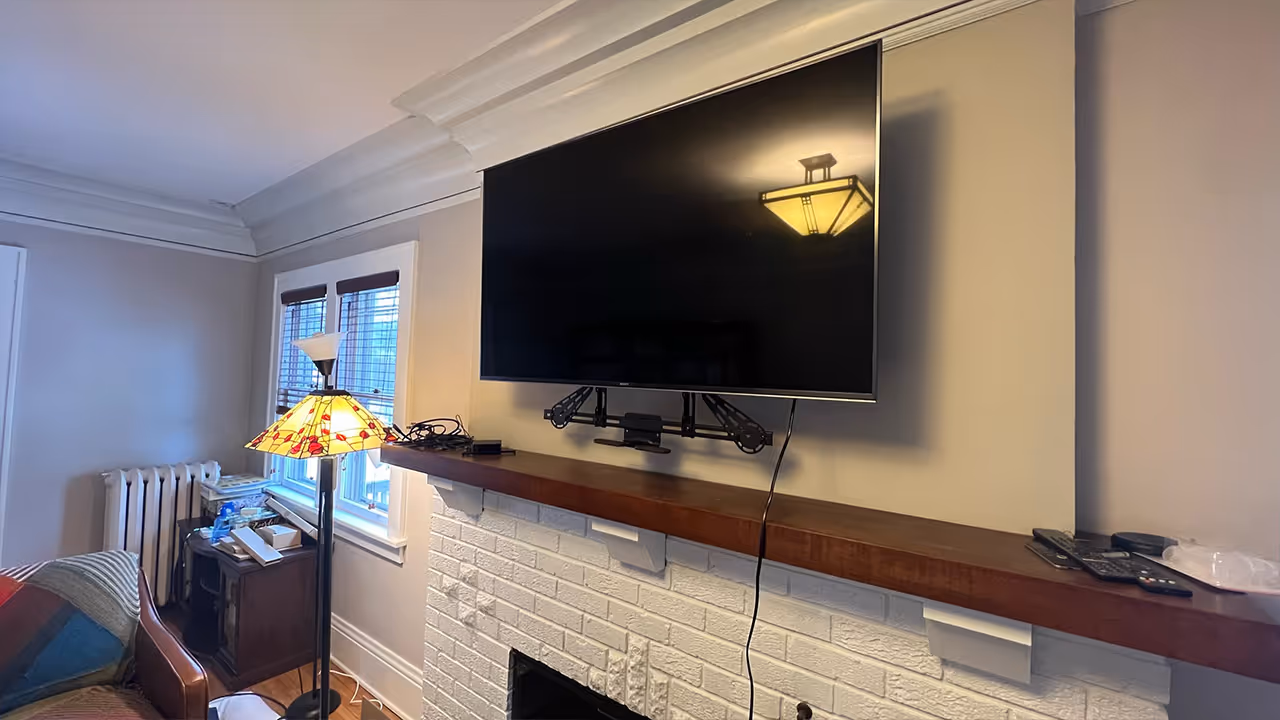 55" TV Mounted With The Mantle Mount in Minnetonka