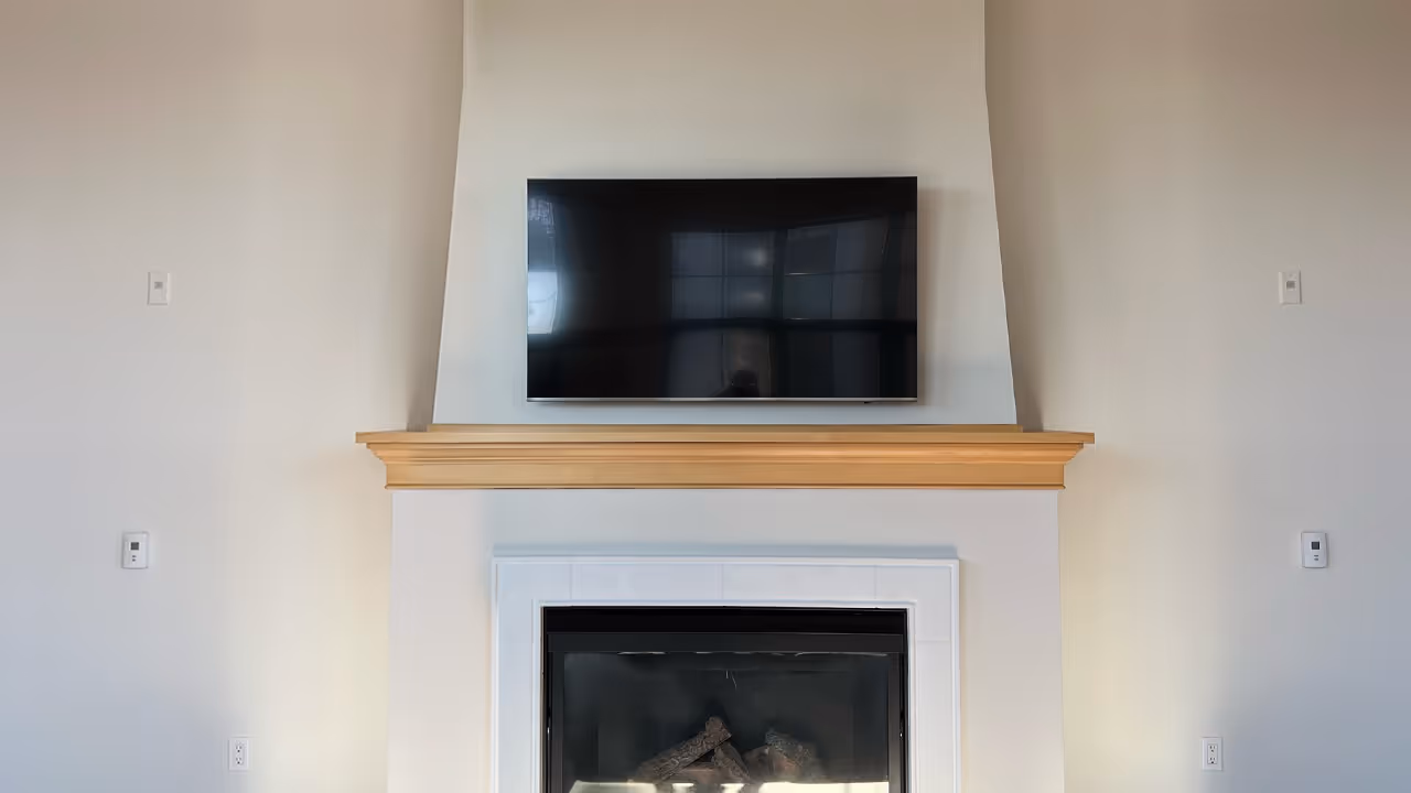 65" TV Mounted With In Wall Cord Concealing in Minneapolis