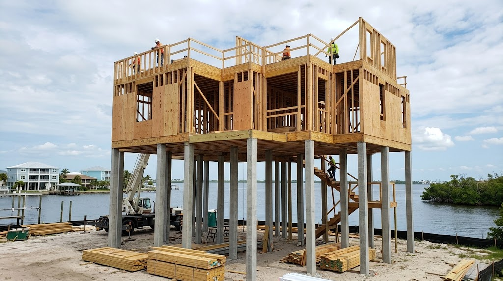 Coastal home undergoing post-hurricane reconstruction and elevation in Lee County requiring Fort Myers home insurance.