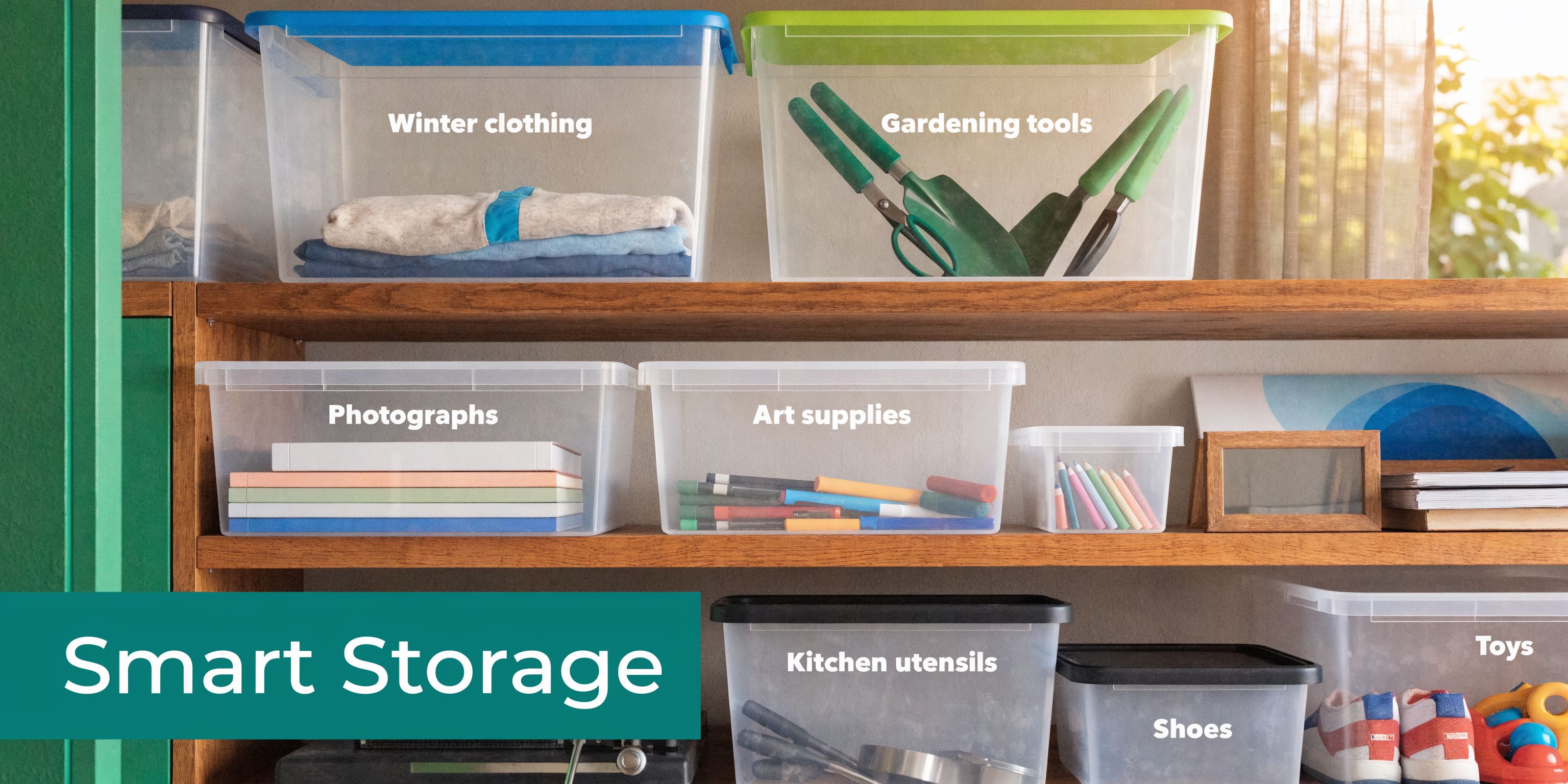 A wooden shelving unit organized with labeled plastic storage bins containing household items like clothing and tools.