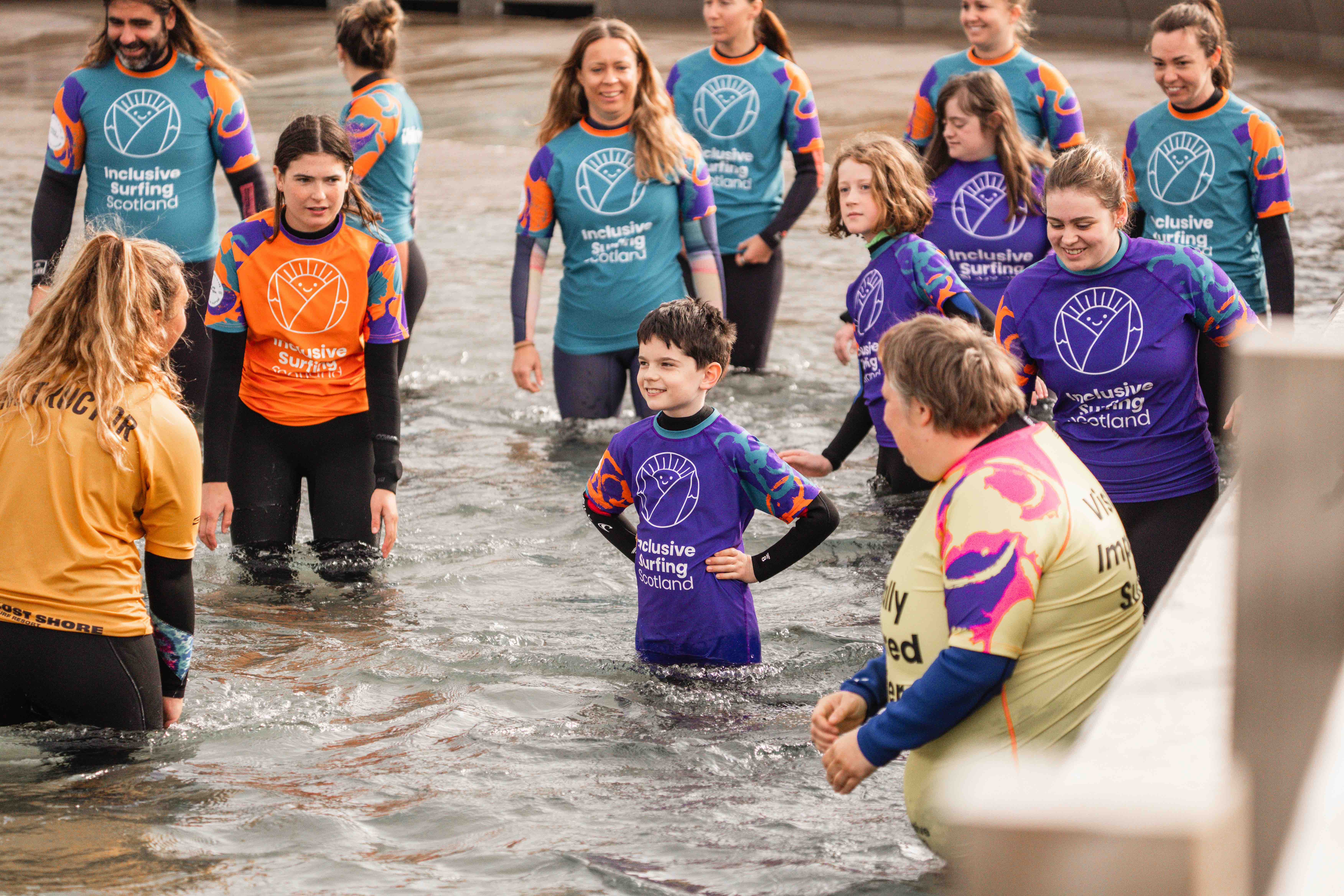 An adaptive surfer riding a wave prone