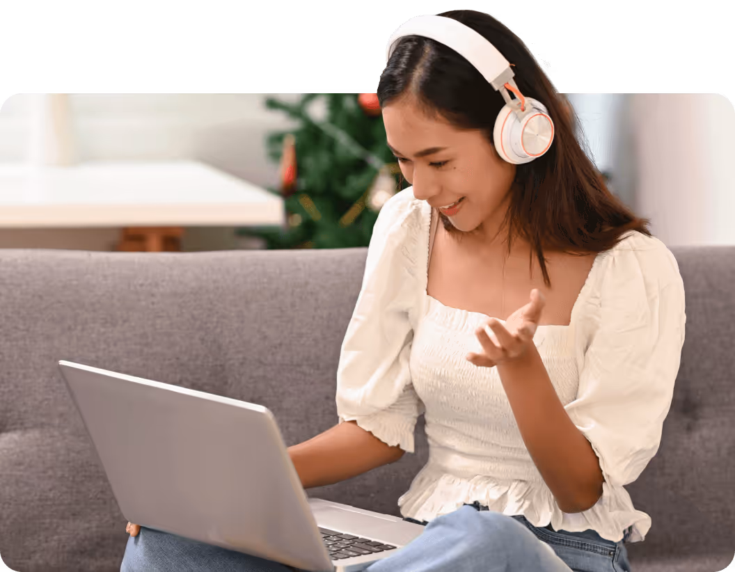 a young woman with laptop and earphones