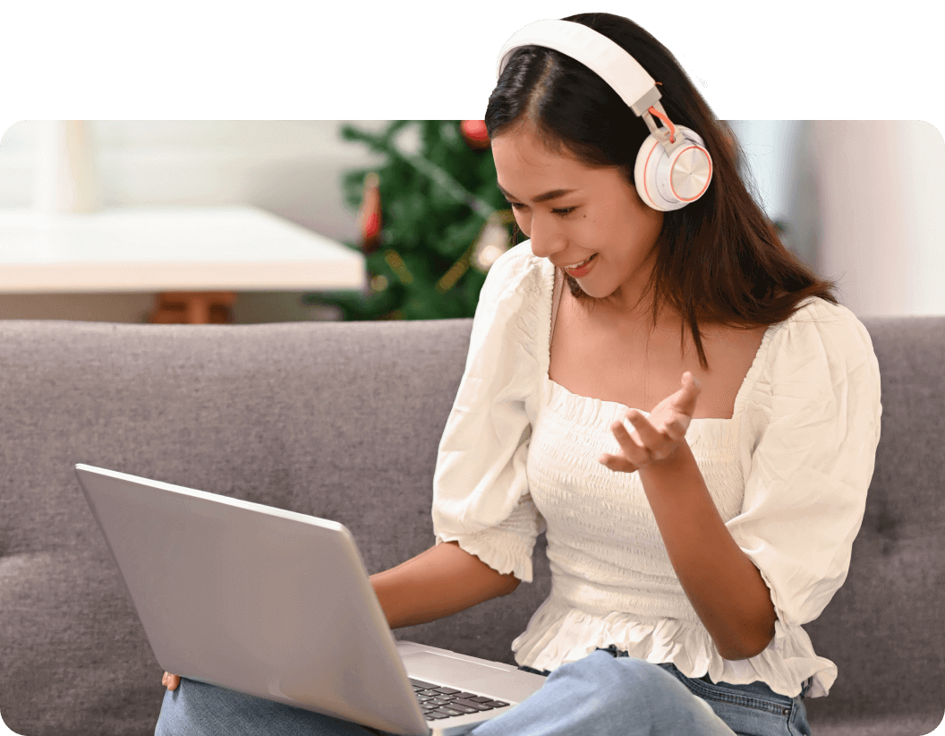 a young woman with laptop and earphones