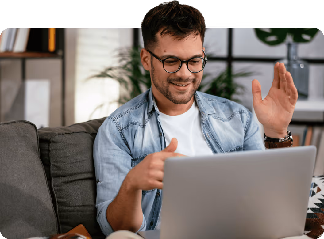 a young man with a laptop