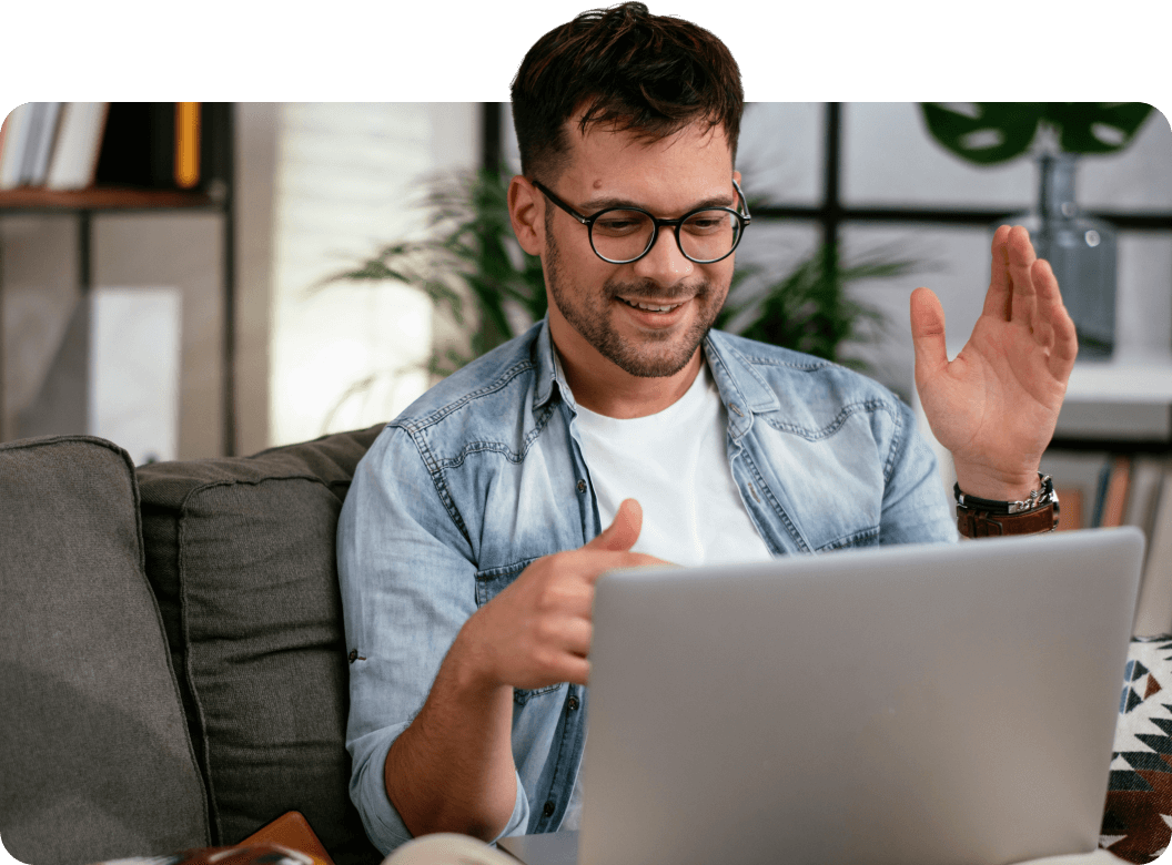 a young man with a laptop