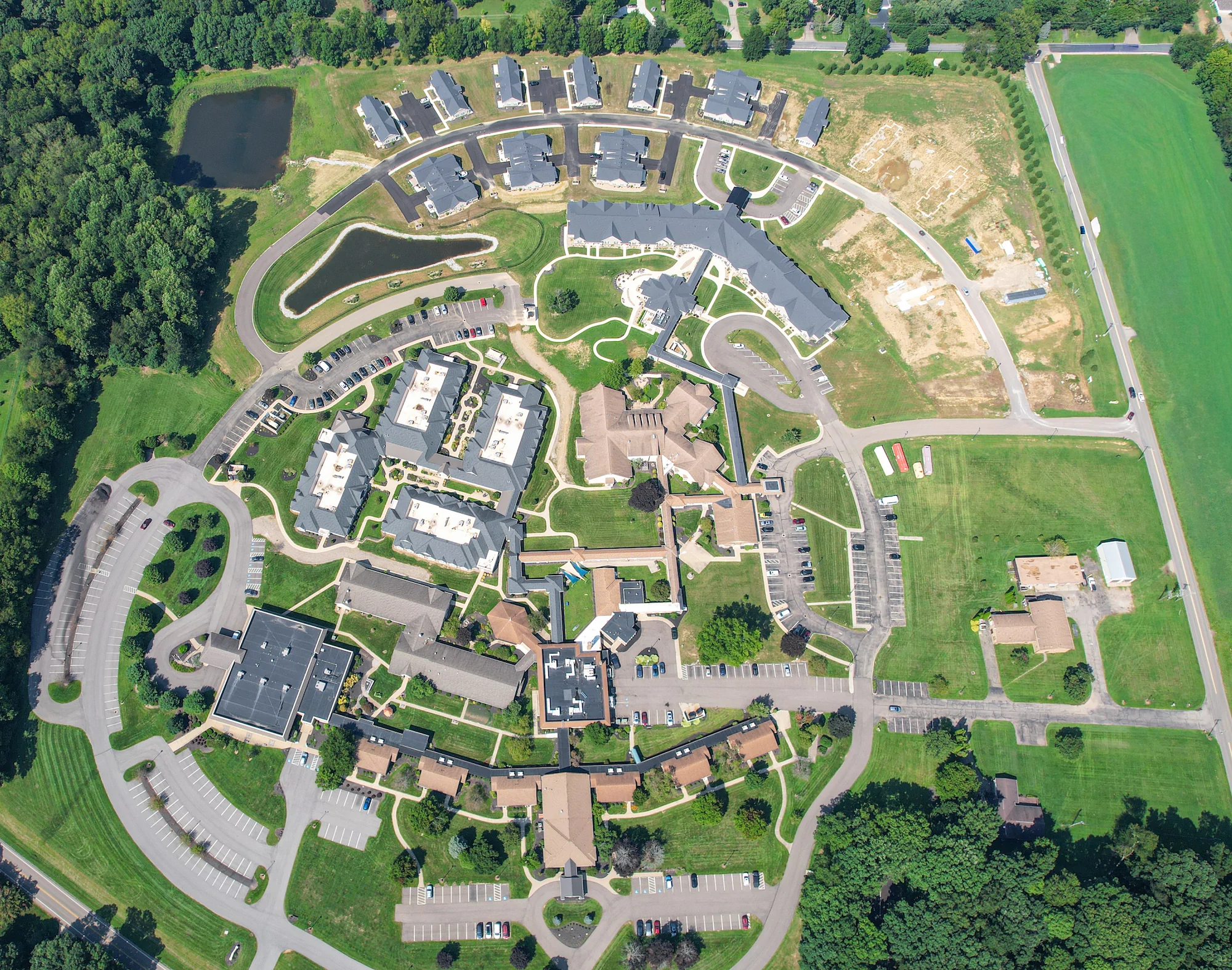 The entire campus of The Ohio Eastern Star shown from above, including the Pine Hill independent retirement community.