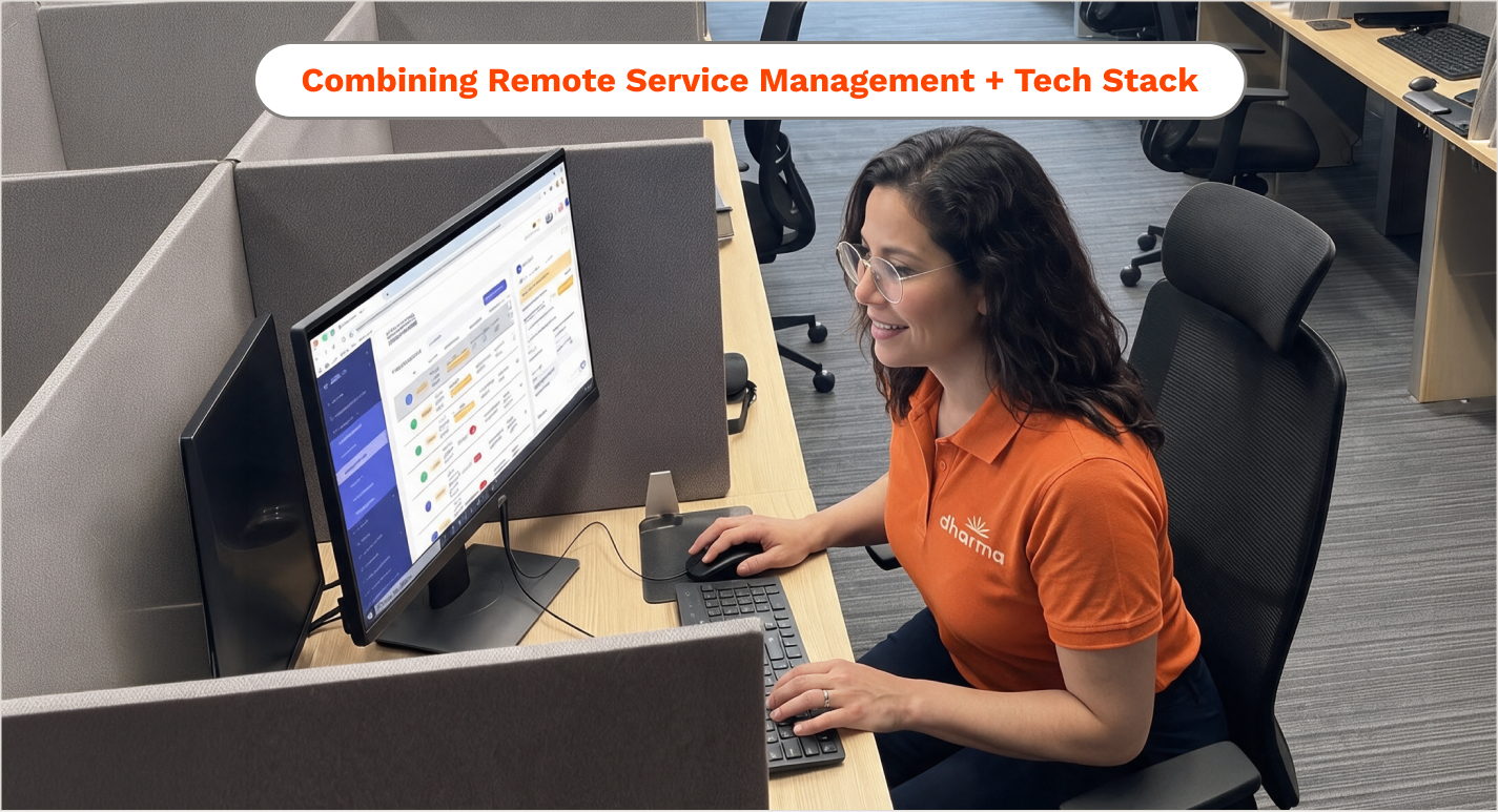 Property manager working on desktop with Dharma OPS dashboard on screen