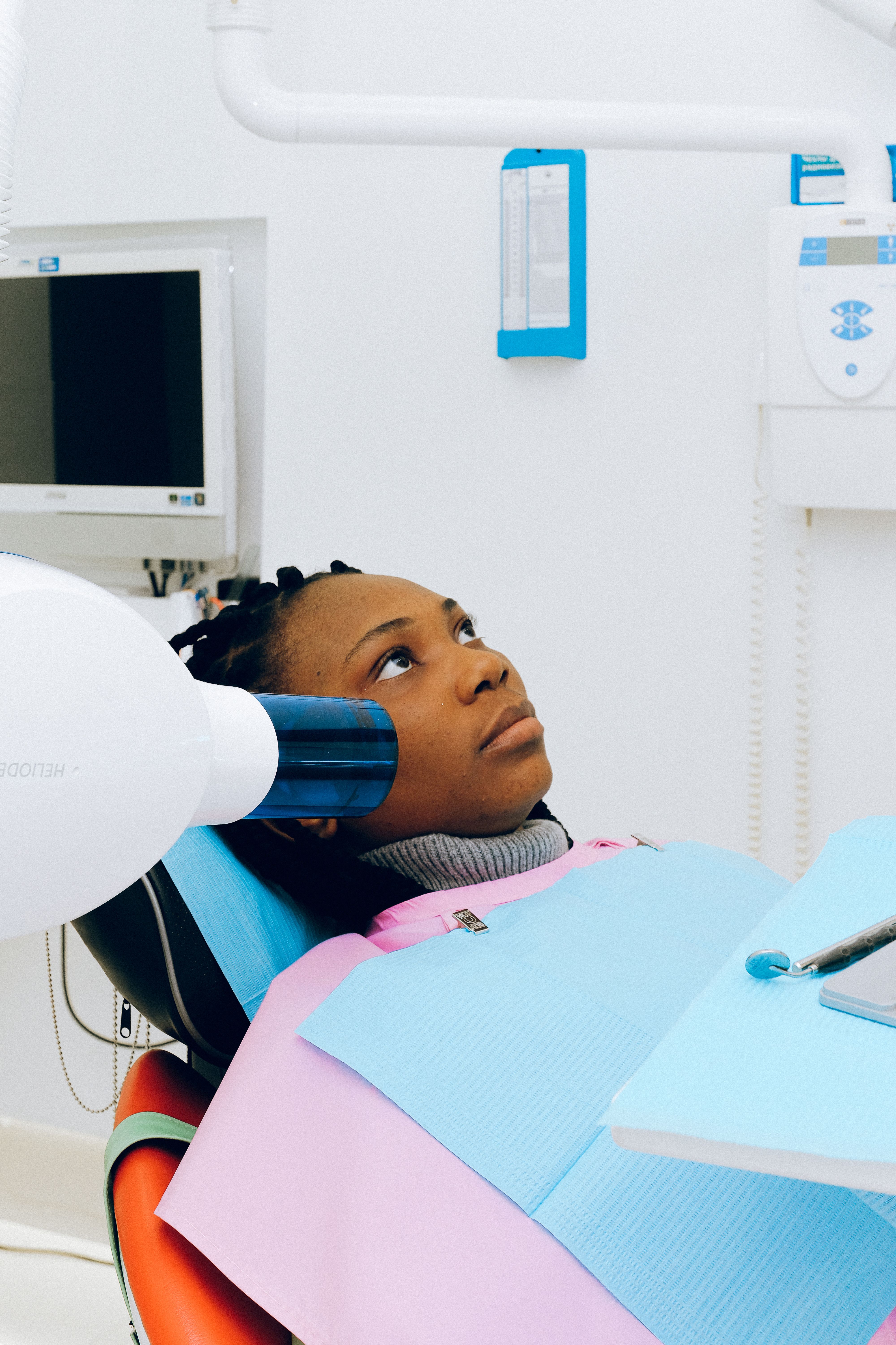 Dentist performing exam or consultation in a modern dental office