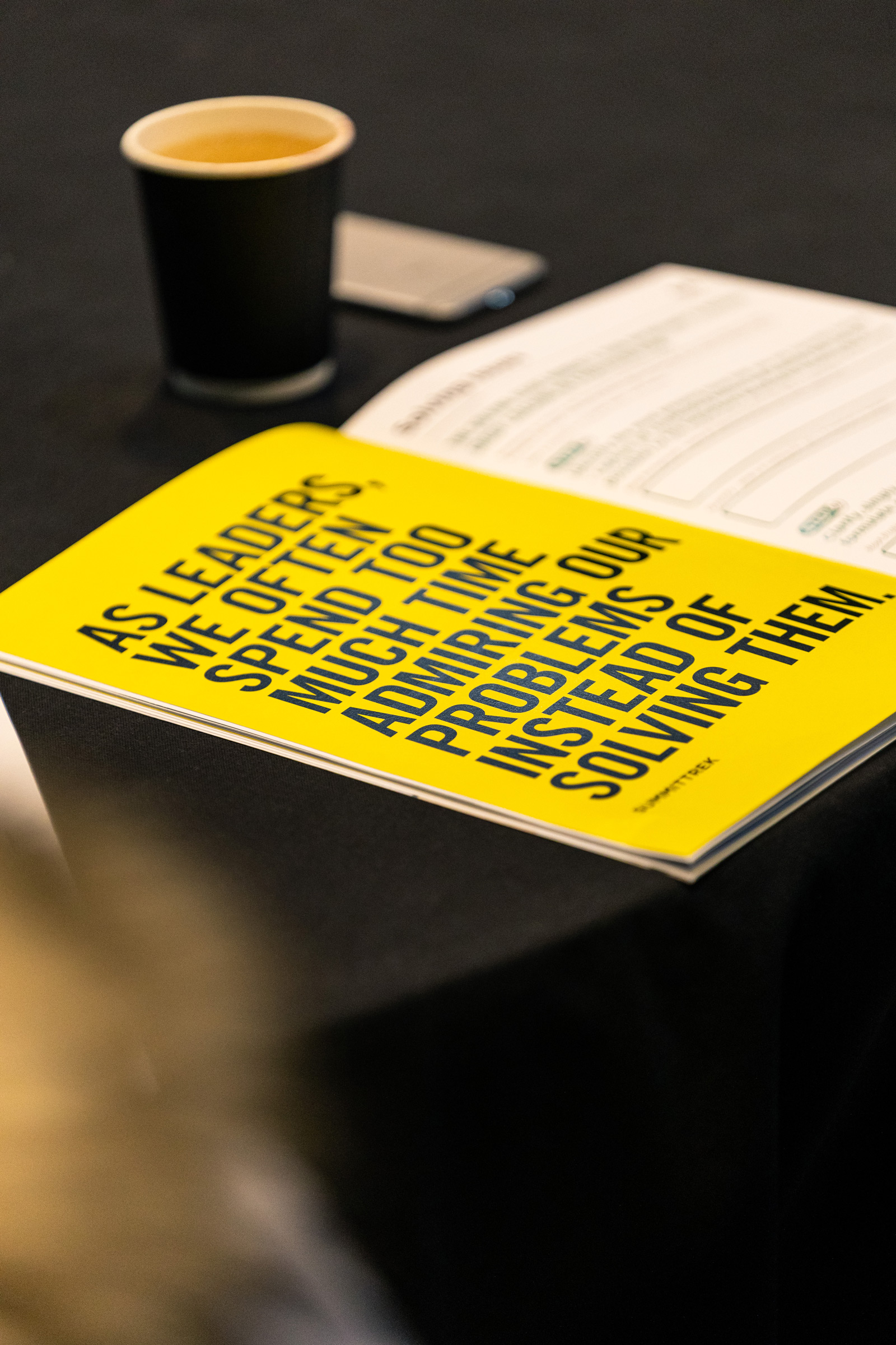 Restory business booklet open to a yellow page.