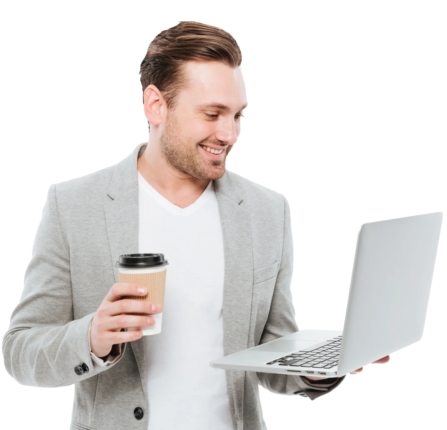 cheerful young businessman drinking coffee using laptop