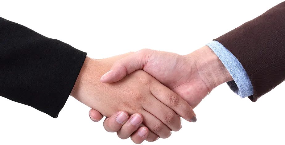 A close up of two people shaking hands.