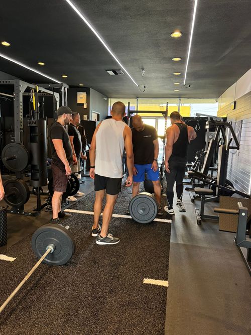 Thrive Community cheering on a member who is about to hit a PR.