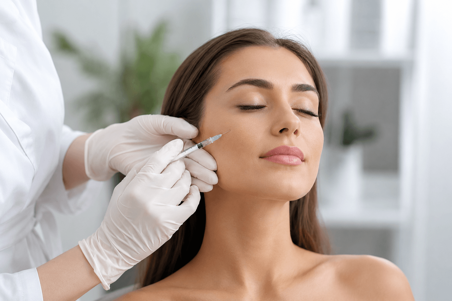 Provider performing Sculptra injections for facial volume restoration in Baton Rouge, Louisiana aesthetic clinic