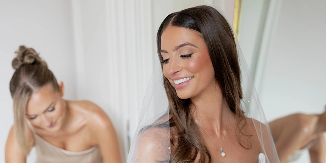 Bride after getting wedding makeup professionally applied before the ceremony.