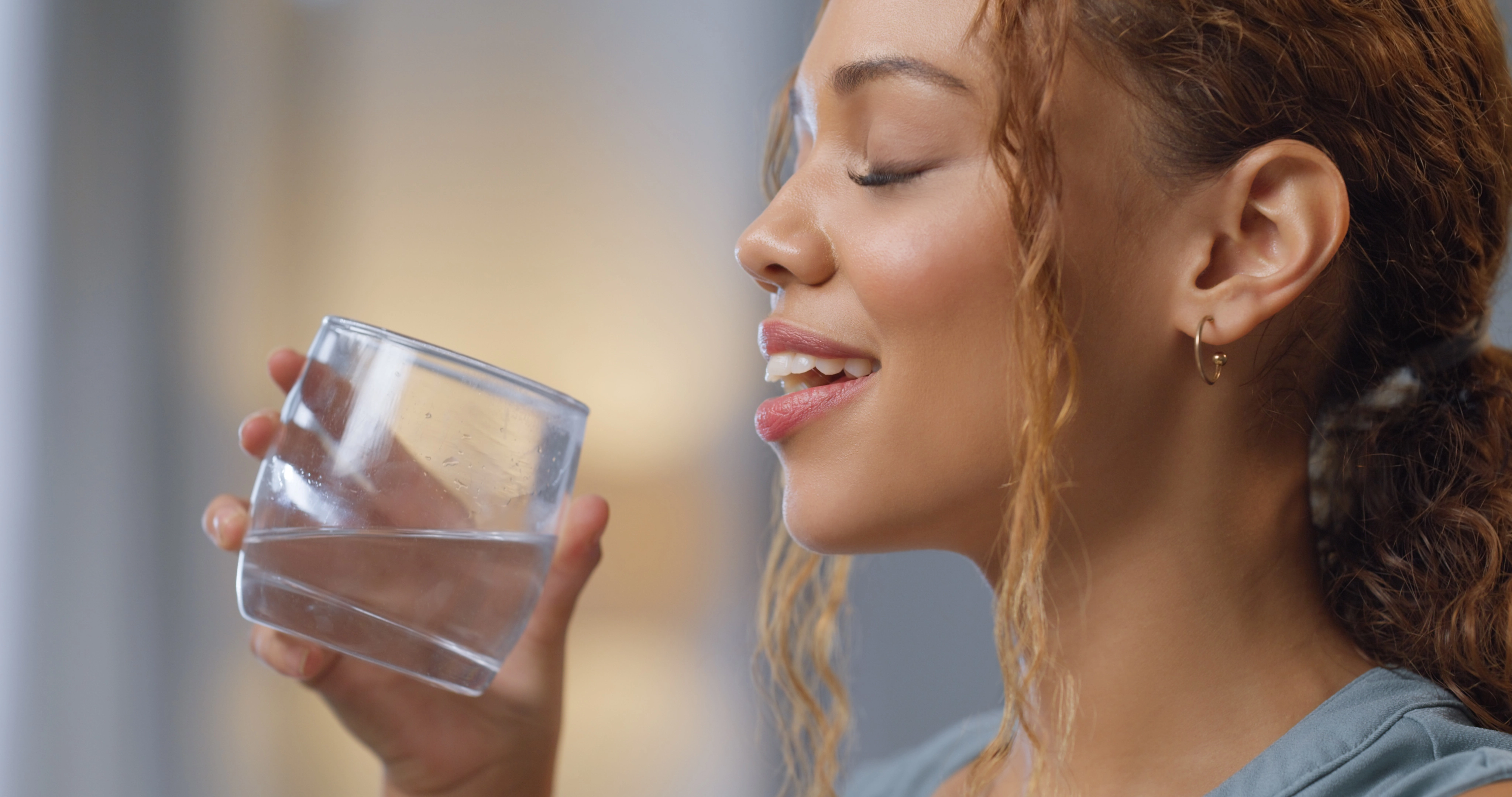 Columbus Esthetician drinking water