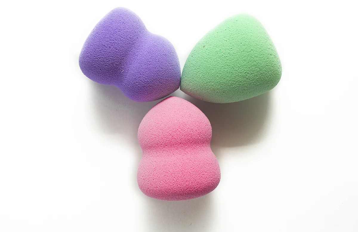 Colored makeup sponges needing to be washed.