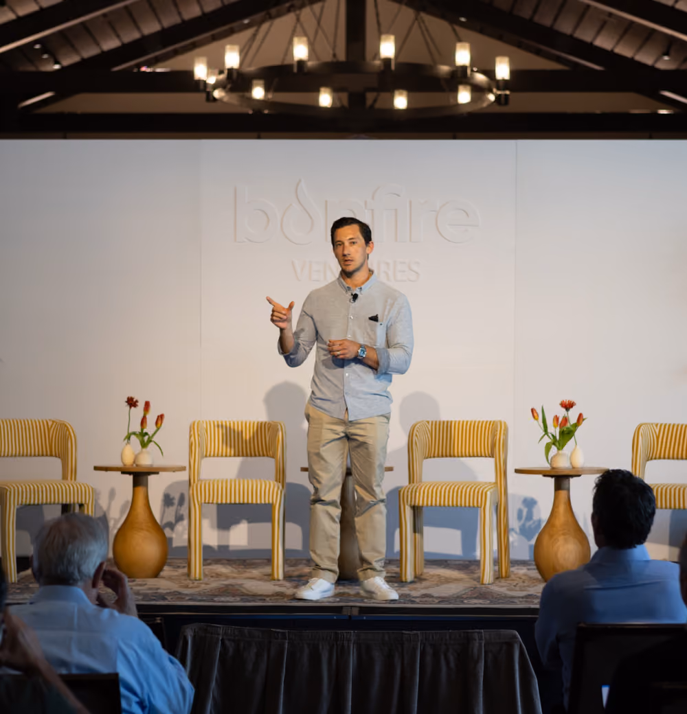 A speaker presents onstage at a Bonfire Ventures event.