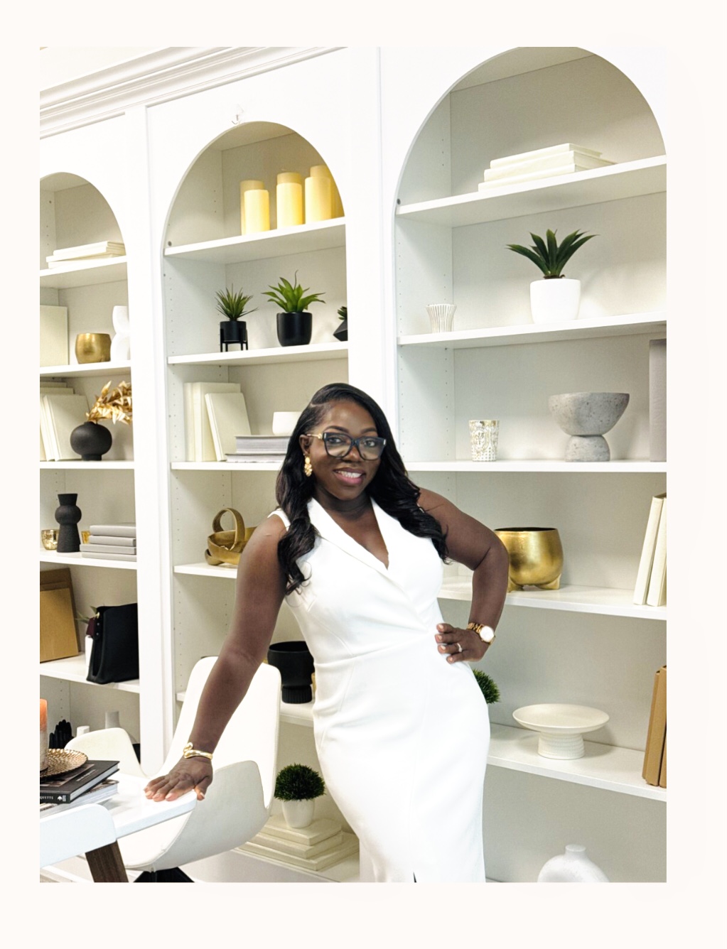 Magdalene Acquah sitting on a chair and looking forward.