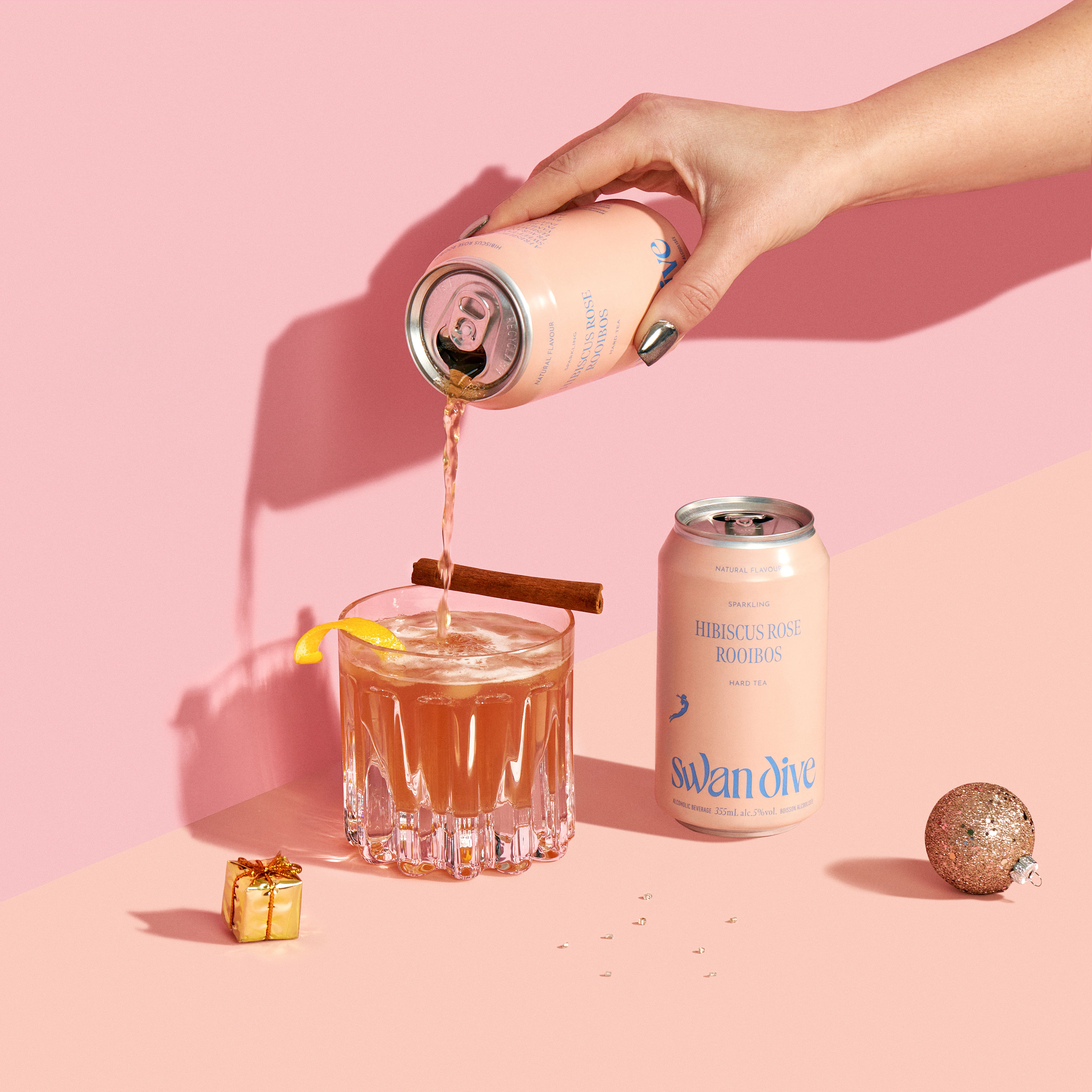A can of Swanone is poured into a glass.