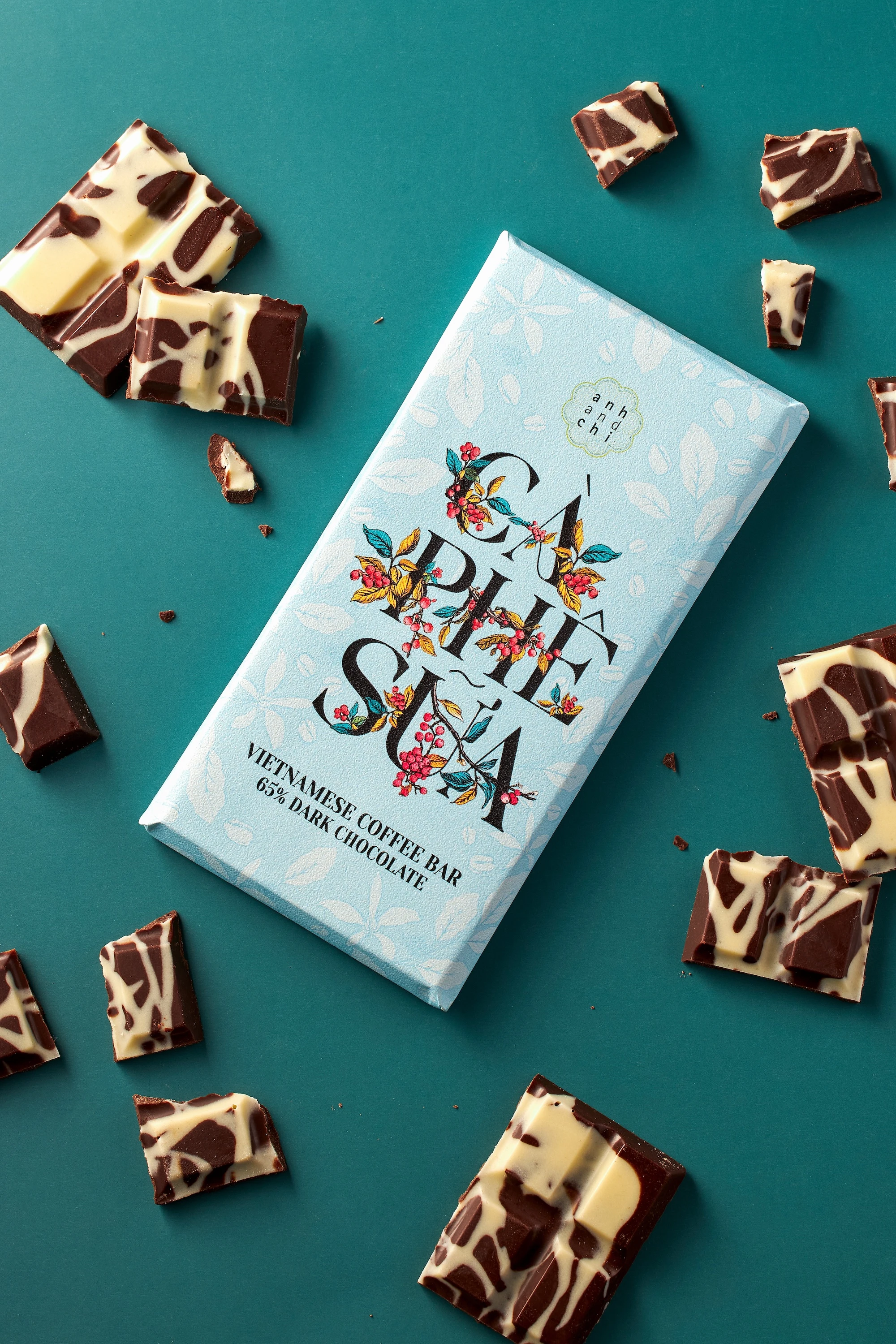 A cocoa bar with a flower design on it.
