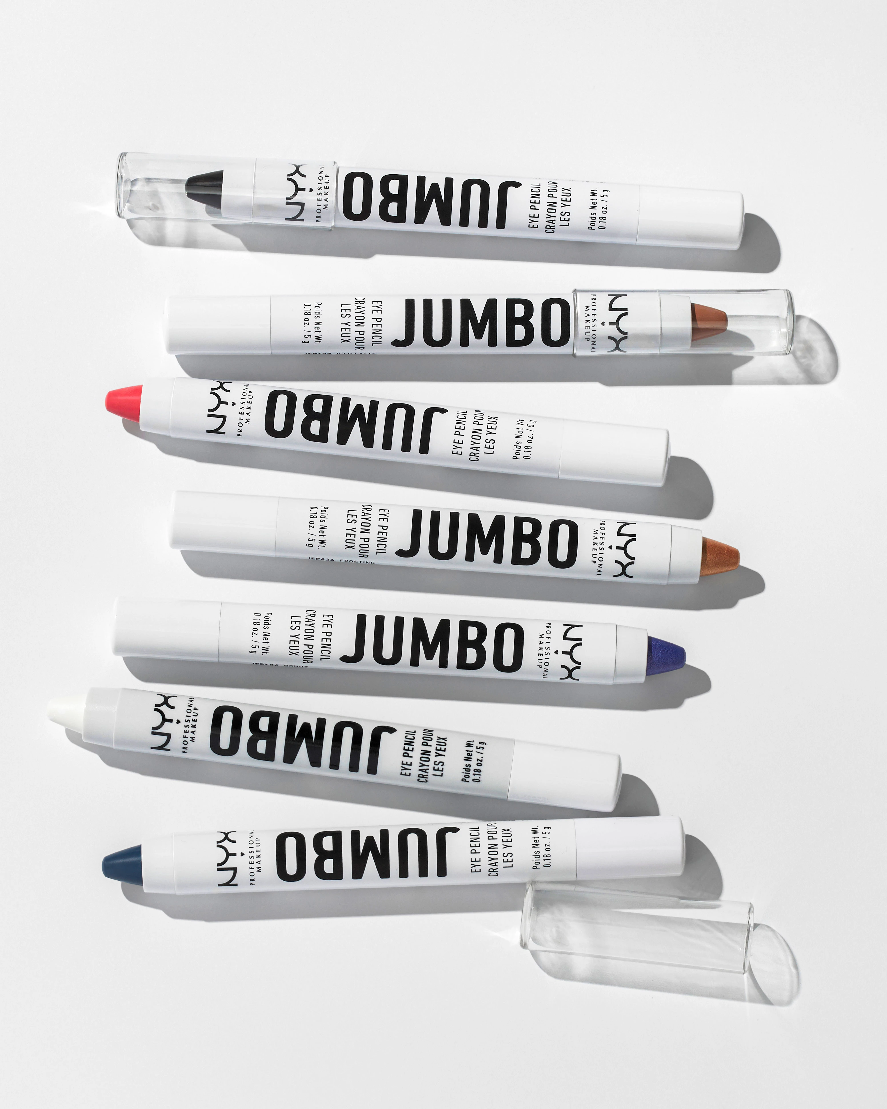 A row of five white and blue tubes of Jumbo lipstick.