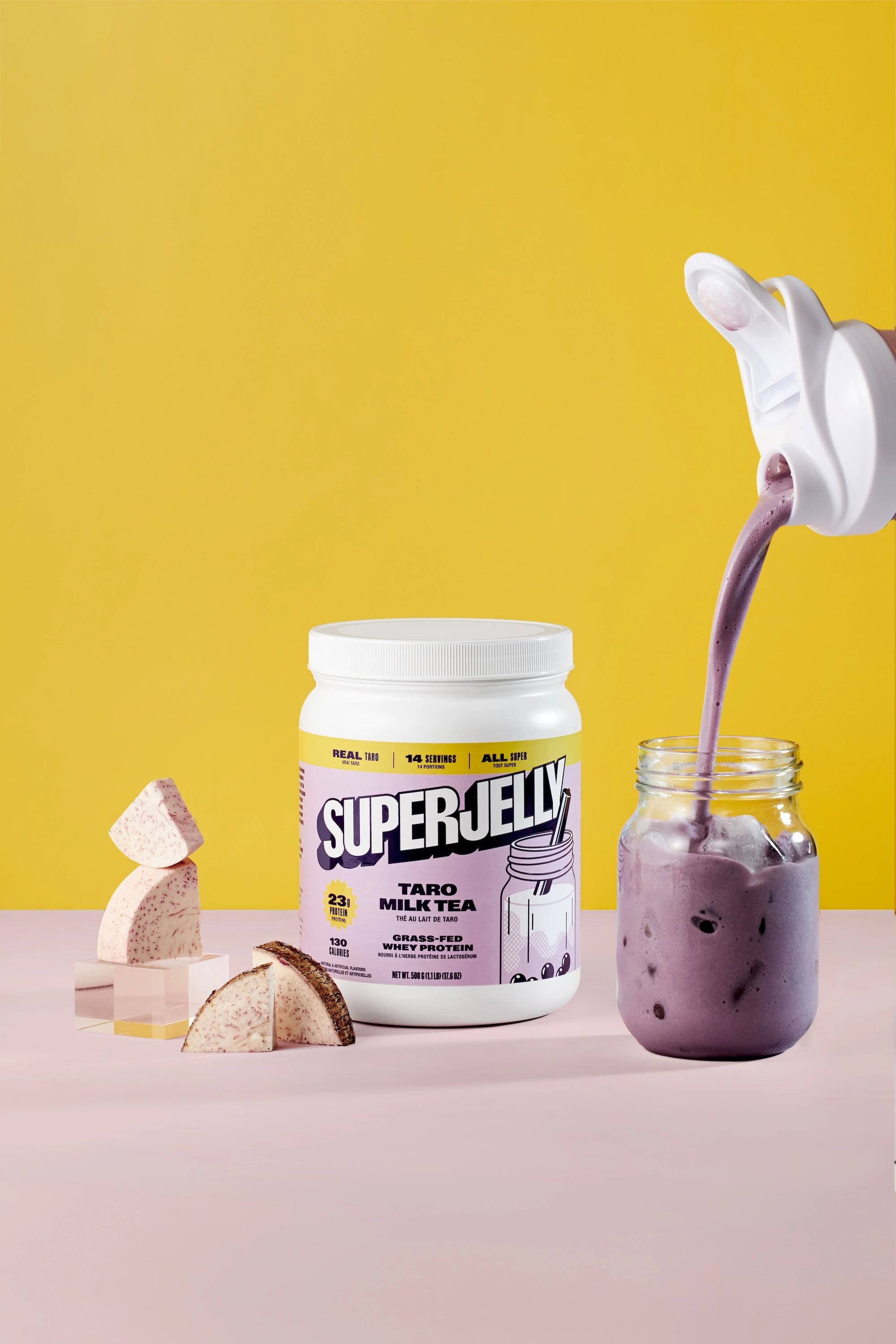 A jar of SuperJelly with a spoon in it.