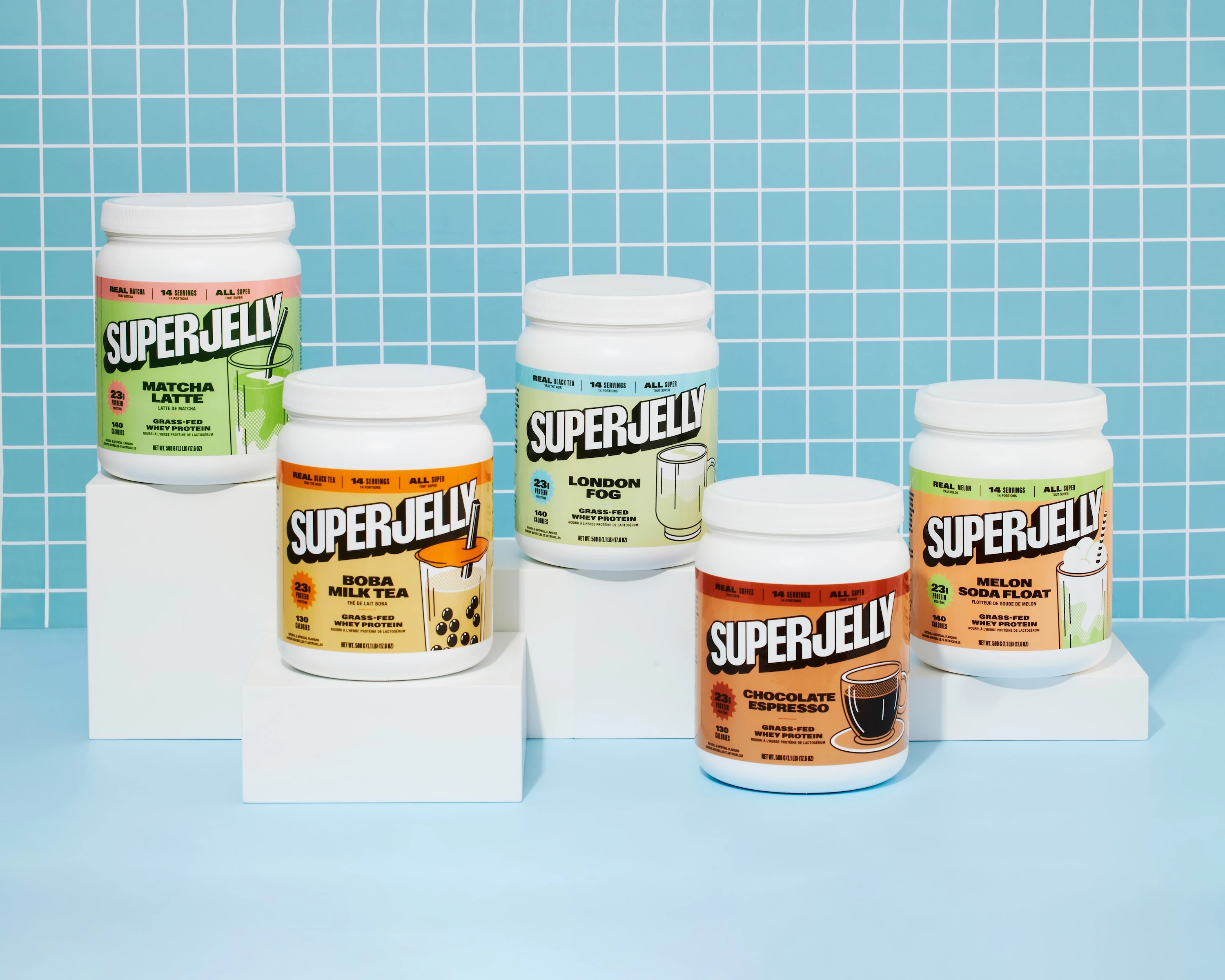 A white table with 6 jars of Super Jelly on it.