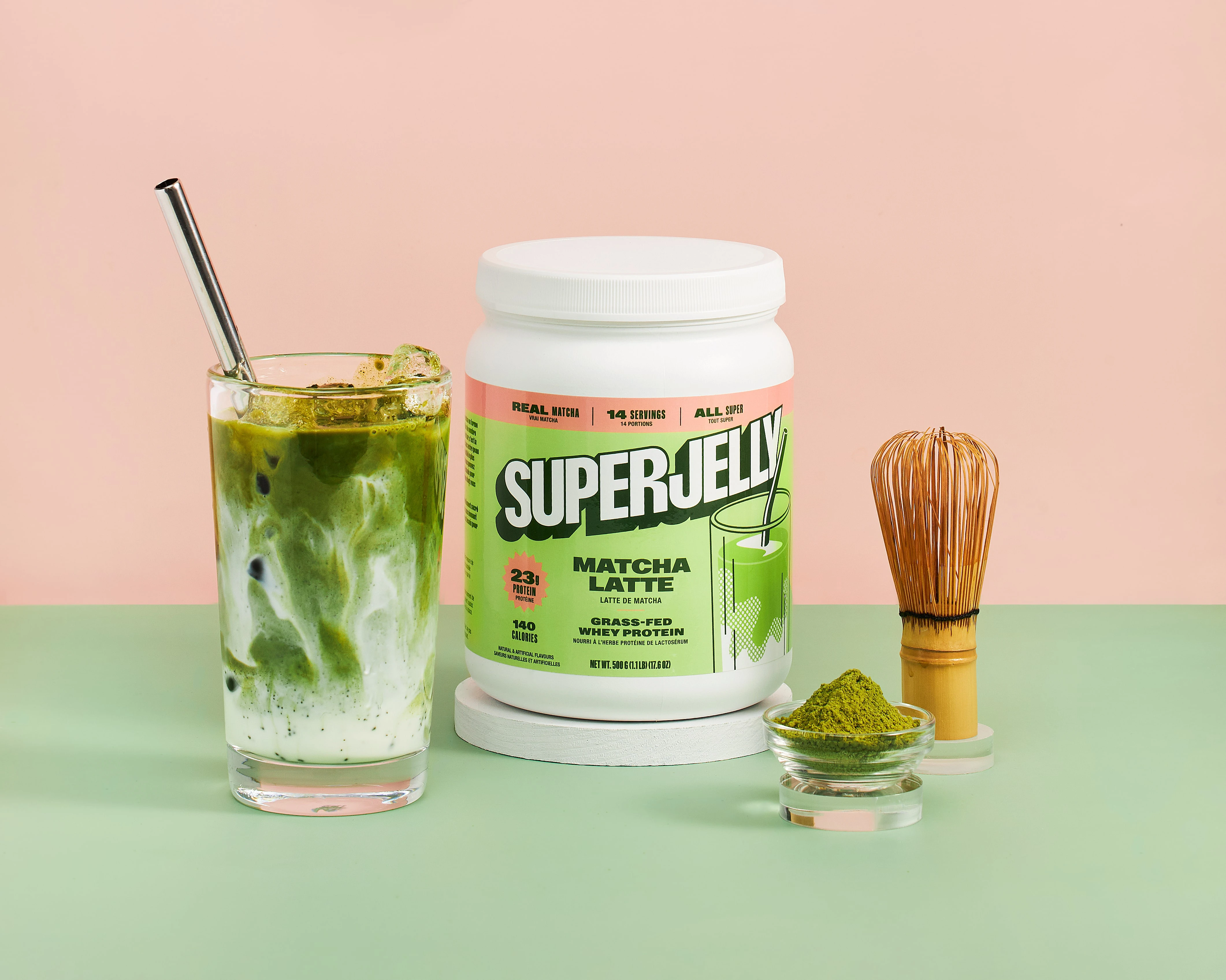 A white container of SuperJelly lattes with a straw in it.