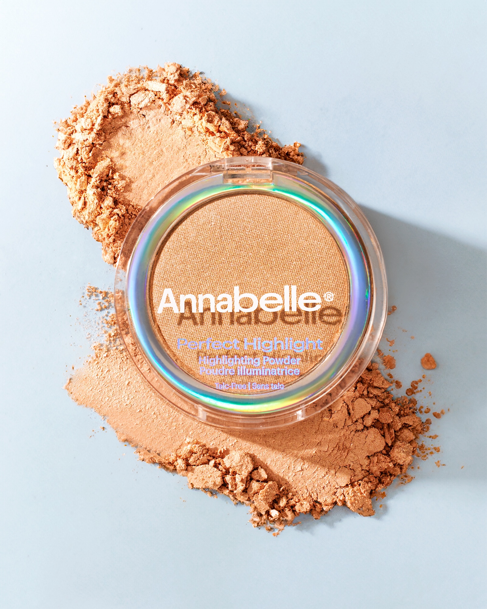 A bottle of Annabelle makeup sits on a table.