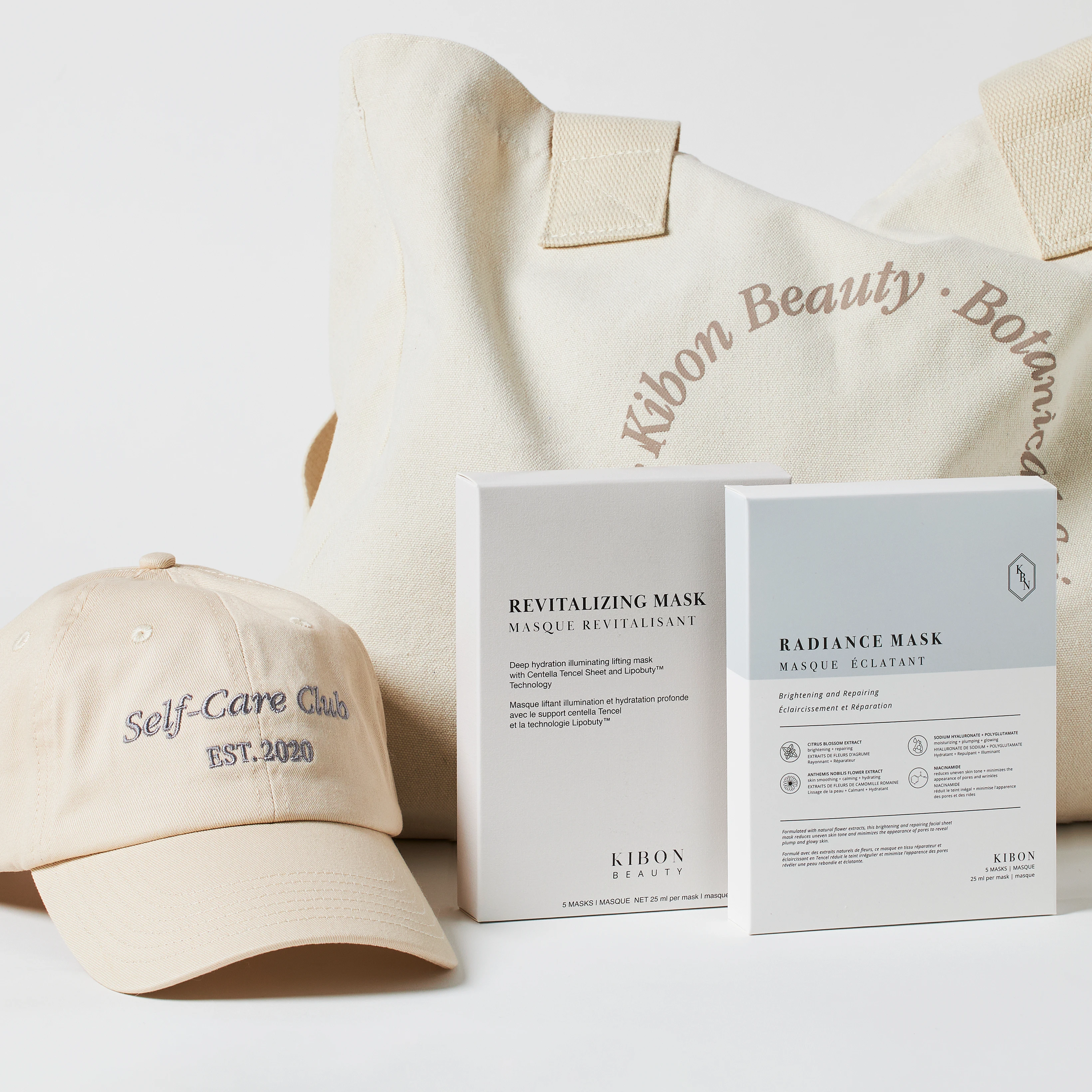 A white and tan bag with a hat and a box of Radiance Mask.