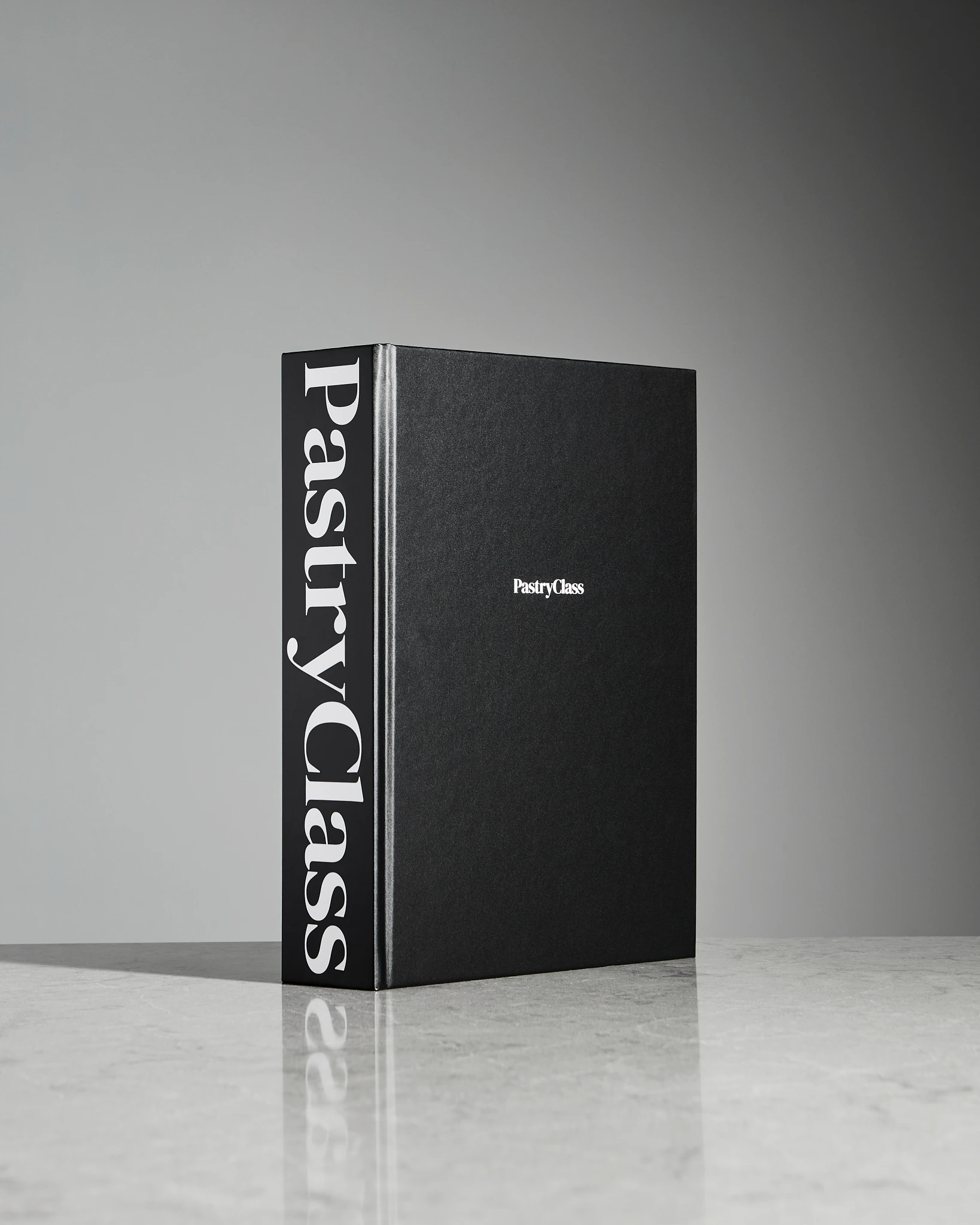 A black book titled Pastry Class.