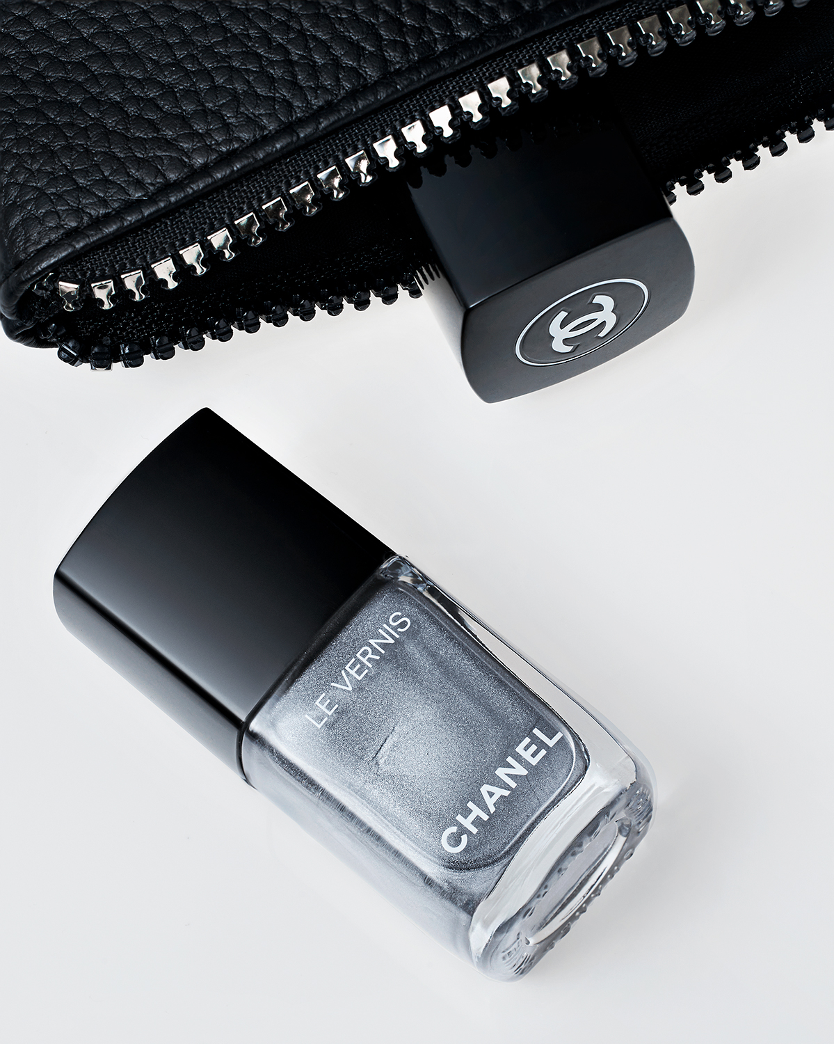 A bottle of Chanel Le Vernis nail polish.
