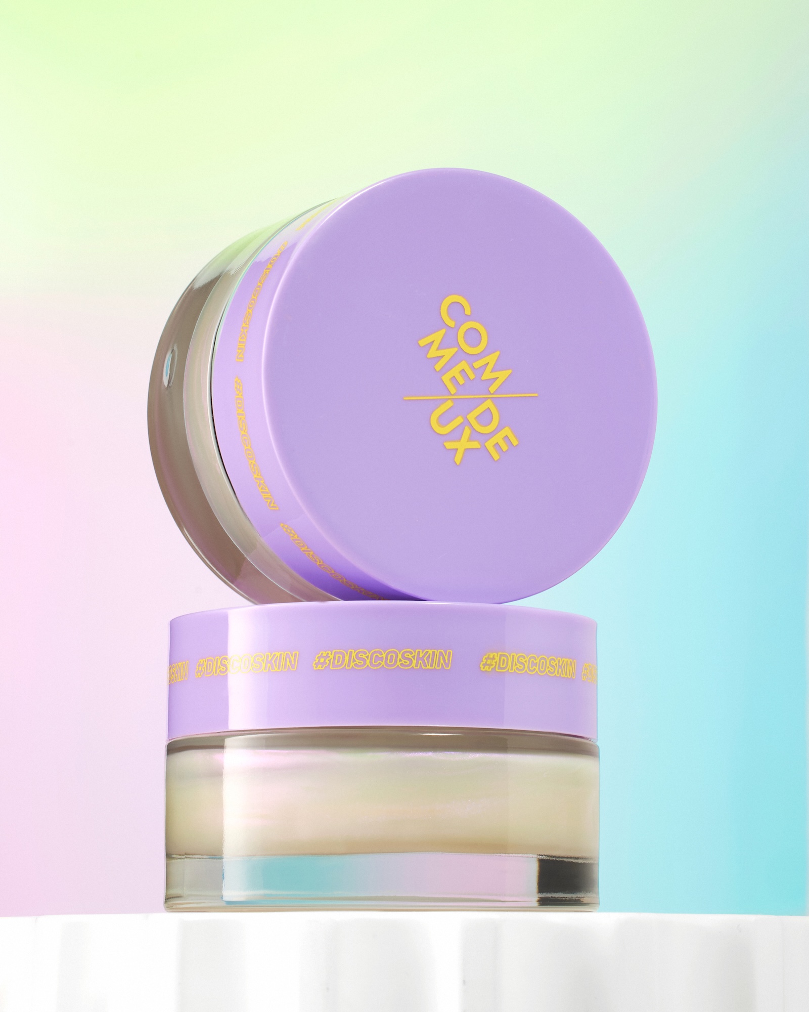 A purple tube of Comme Deux Une Femme.