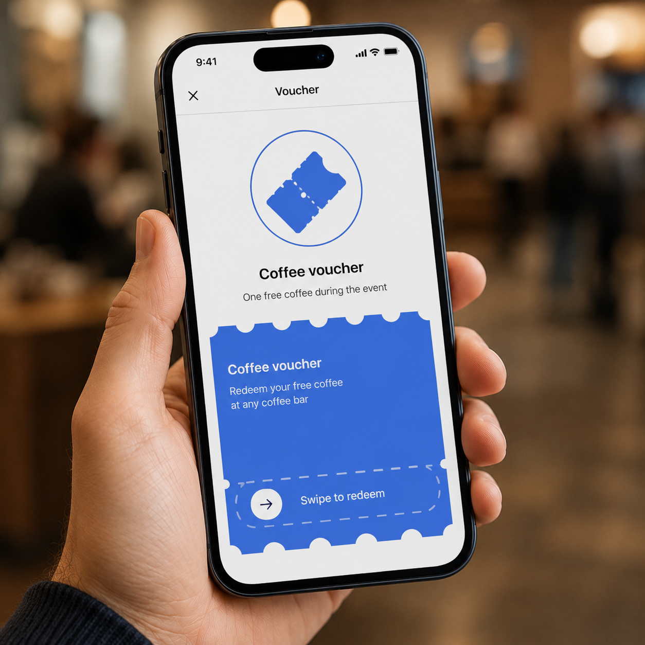Person redeeming a digital event voucher on a smartphone