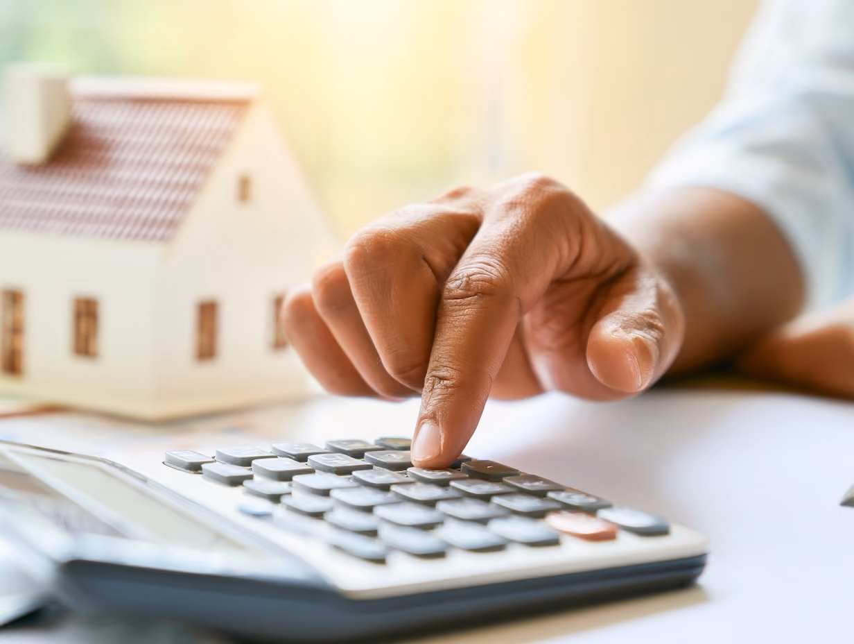 Investor reviewing the numbers on a short-term rental property, showing how to become an Airbnb owner