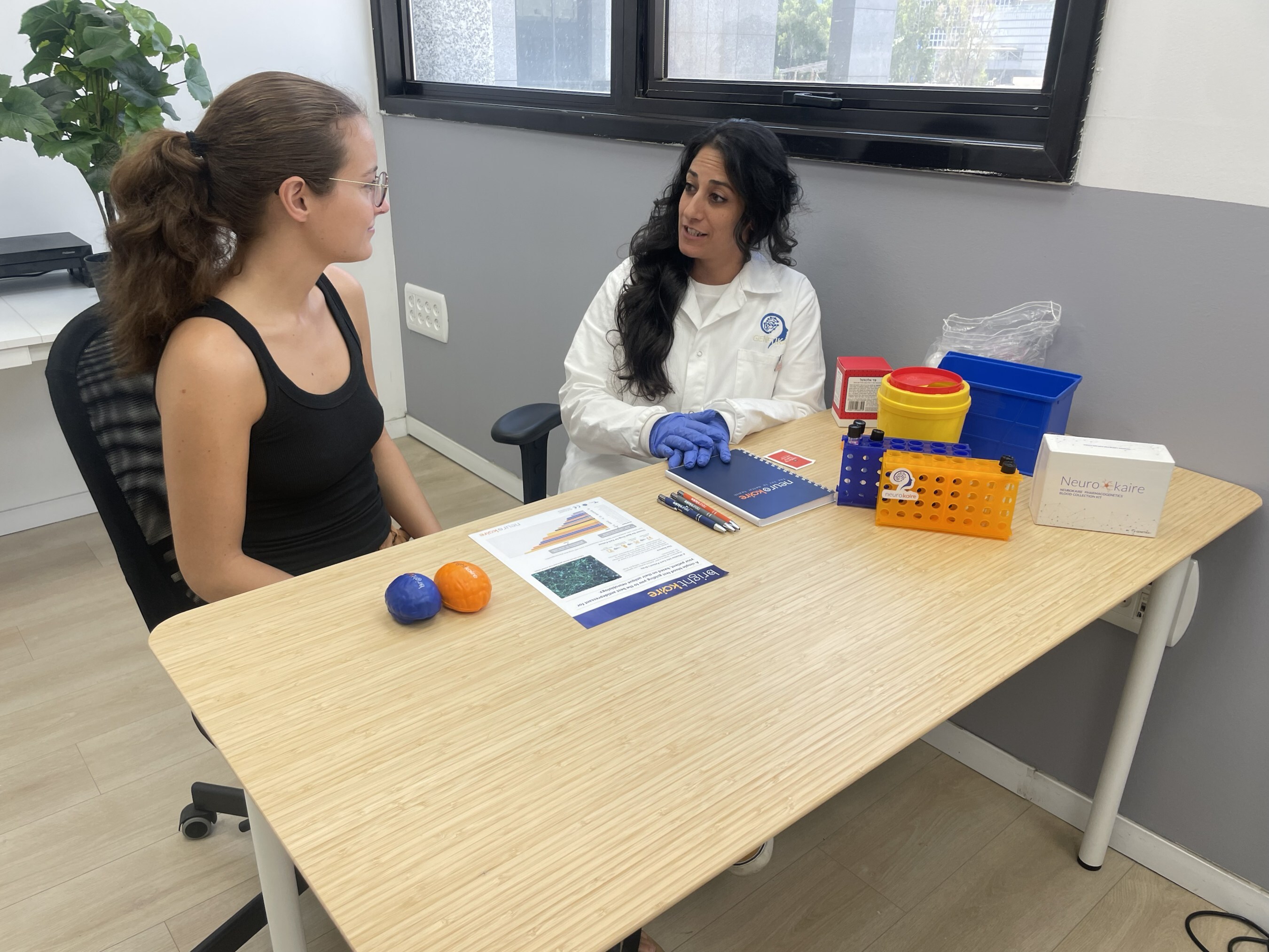 Clinician discussing personalized mental health treatment options with a patient, supported by NeuroKaire’s precision medicine test for depression care.