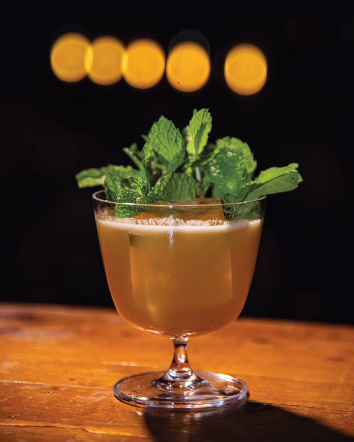 still austin whish fool's gold cocktail on table