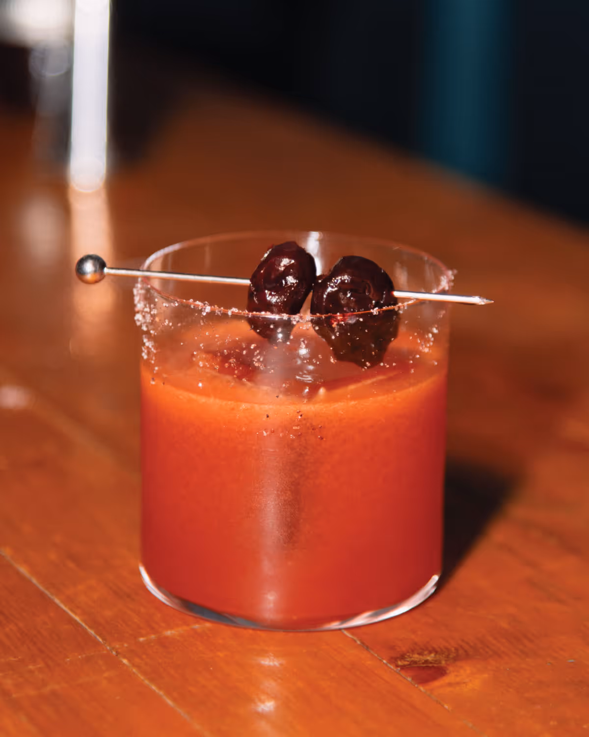 still austin whish fool's gold cocktail on table