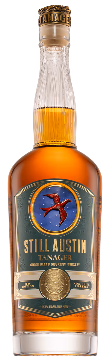 A bottle of still austin Tanager Whiskey
