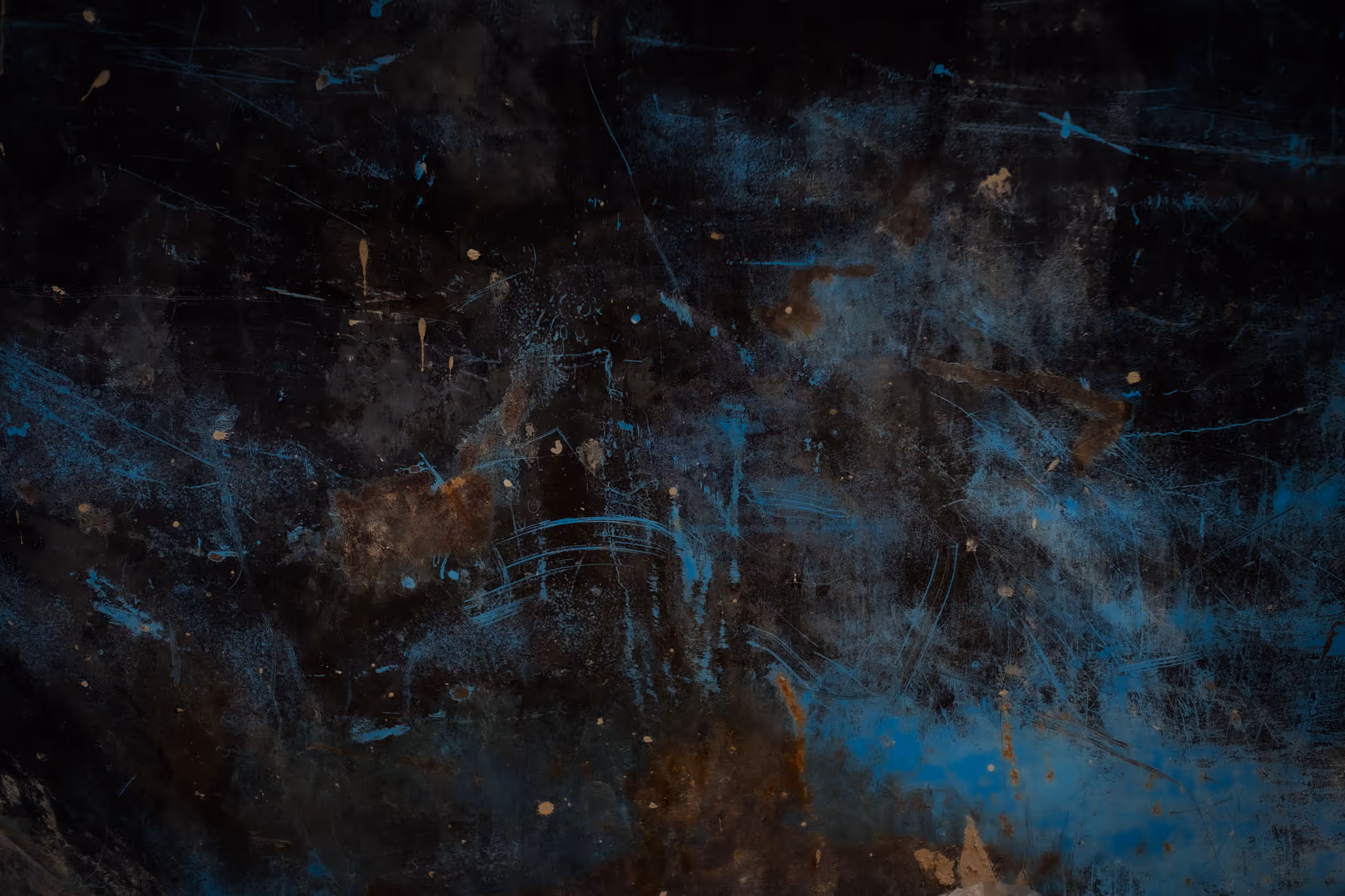 Dark grungy textured surface with blue and brown smudges and scratches.
