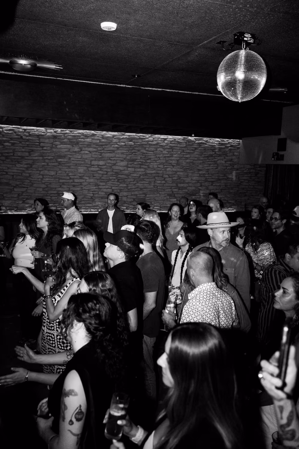 A packed crowd in front of the Music Room stage